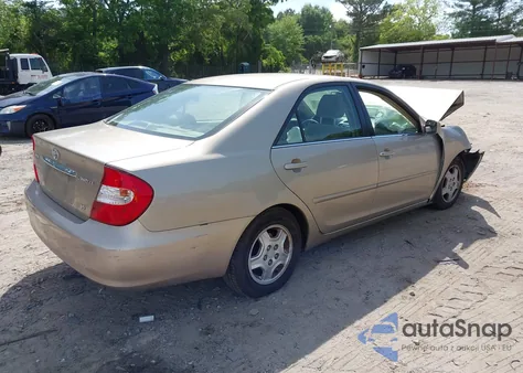 2003 Toyota Camry Le V6 z USA, uszkodzony, nr VIN 4T1BF32K23U544290